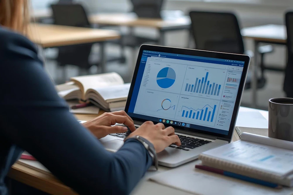 Business dashboard with charts on a laptop